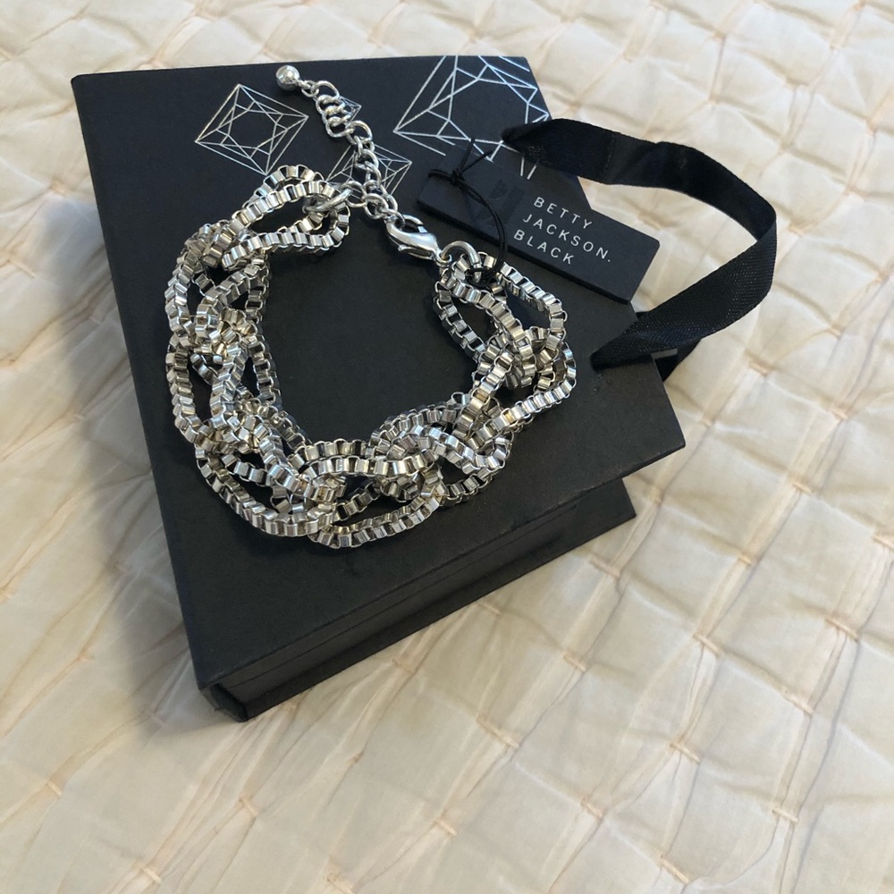 NWT Gorgeous twisted faux silver bracelet in box
